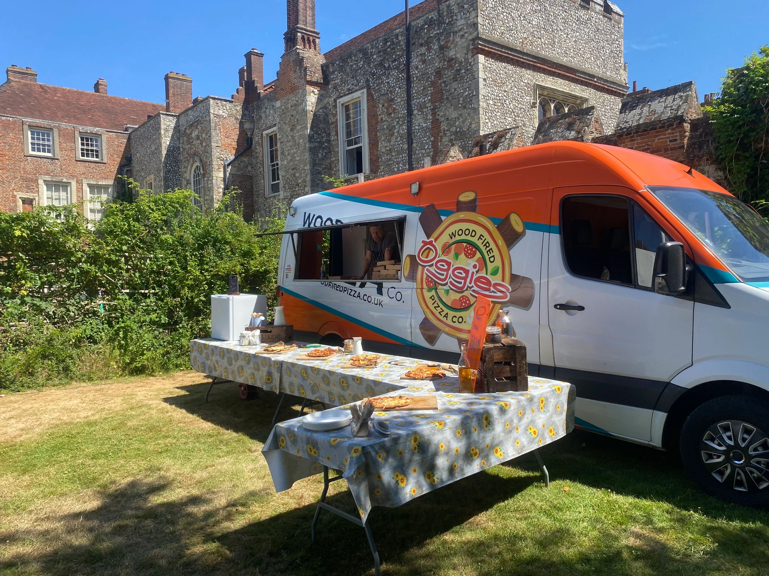 Oggies mobile pizza van at an outdoor gathering